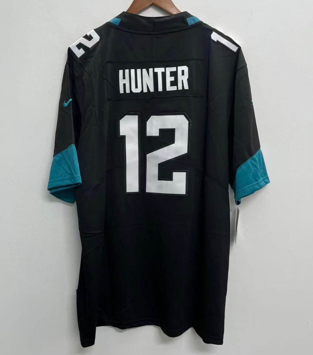 Travis Hunter YOUTH KIDS Jacksonville Jaguars Official NFL Jersey black product image 1, provided for visual reference and