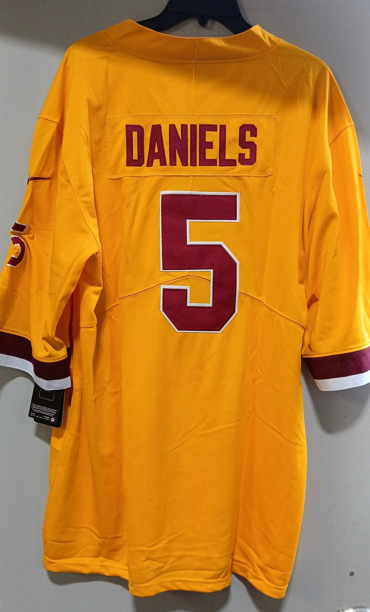 Jayden Daniels Washington Commanders YOUTH Kids Official NFL NIKE Jersey yellow product image 1, provided for visual